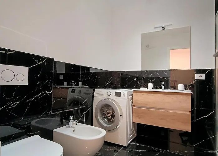 Moderno Bilocale Con Balcone E Posto Auto A